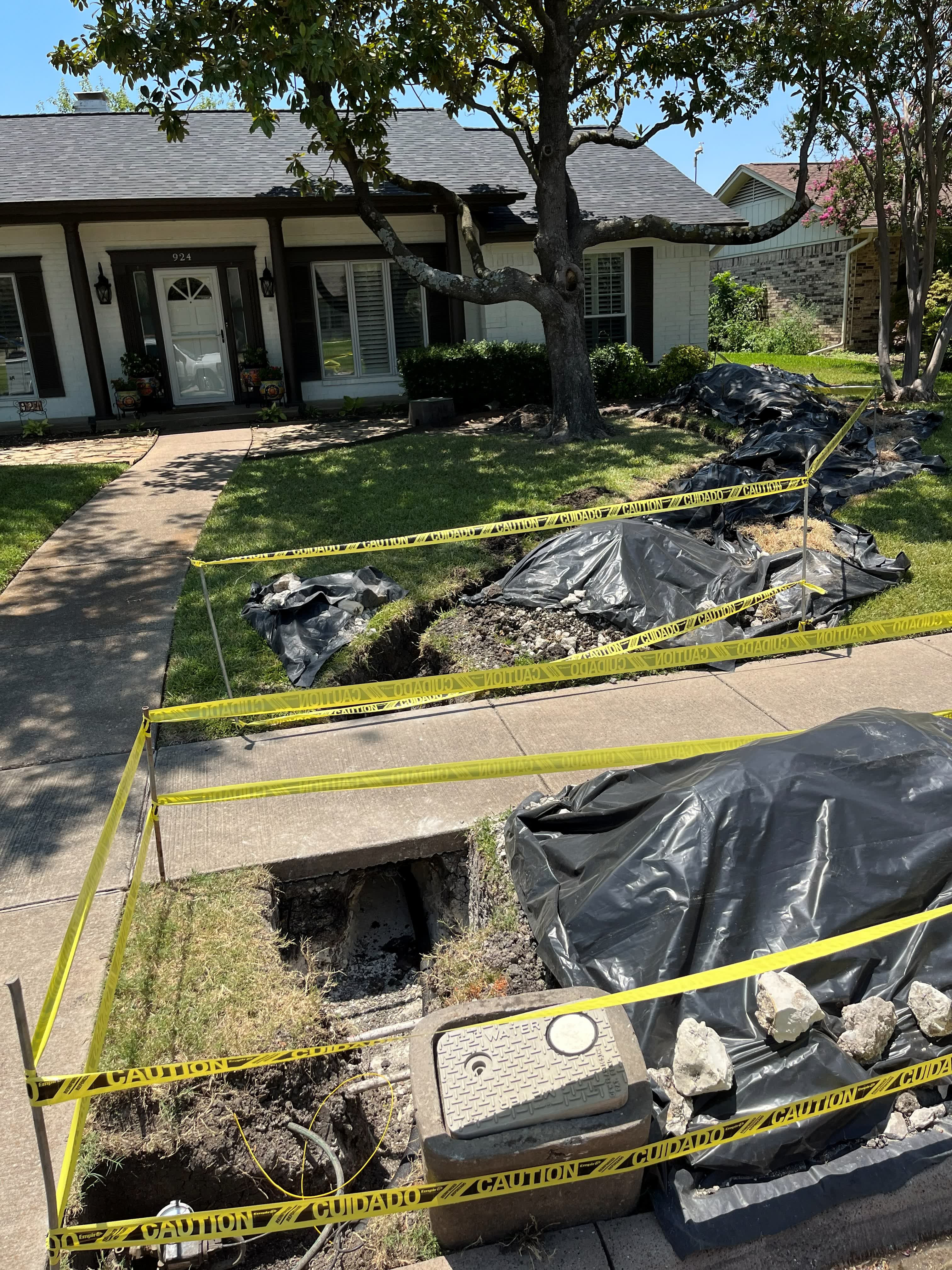 Front yard excavation to reach a failed sewer line