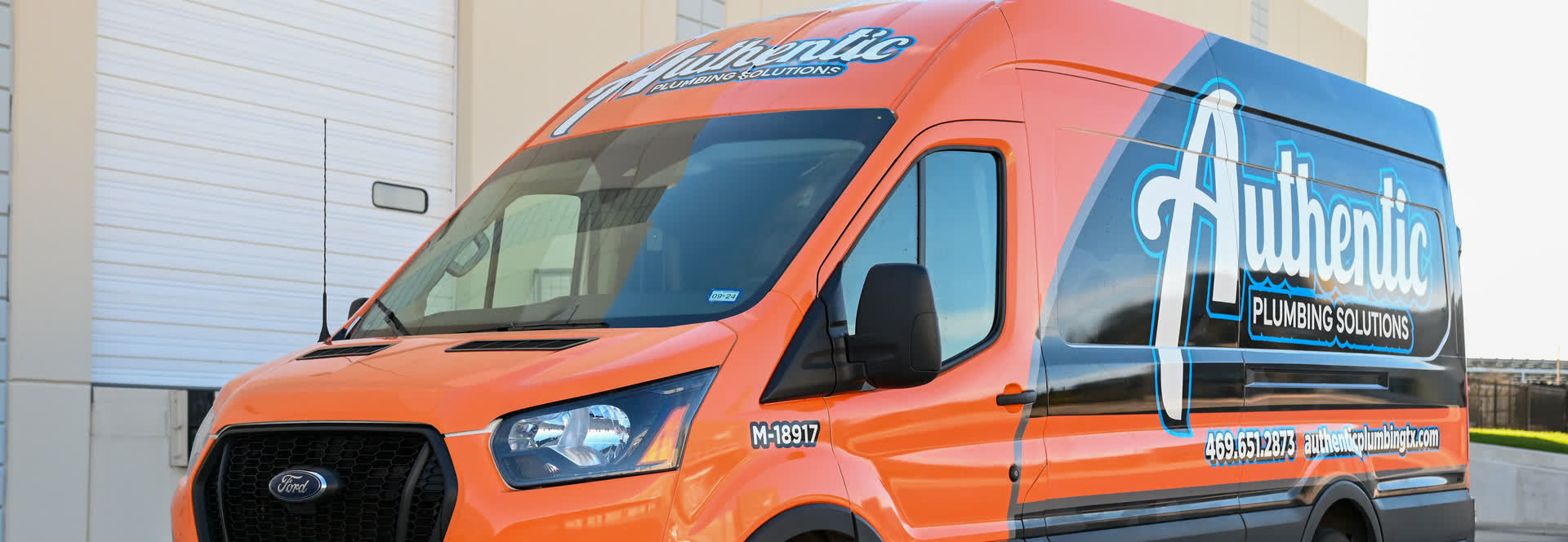 Authentic Plumbing Solutions wrapped service van