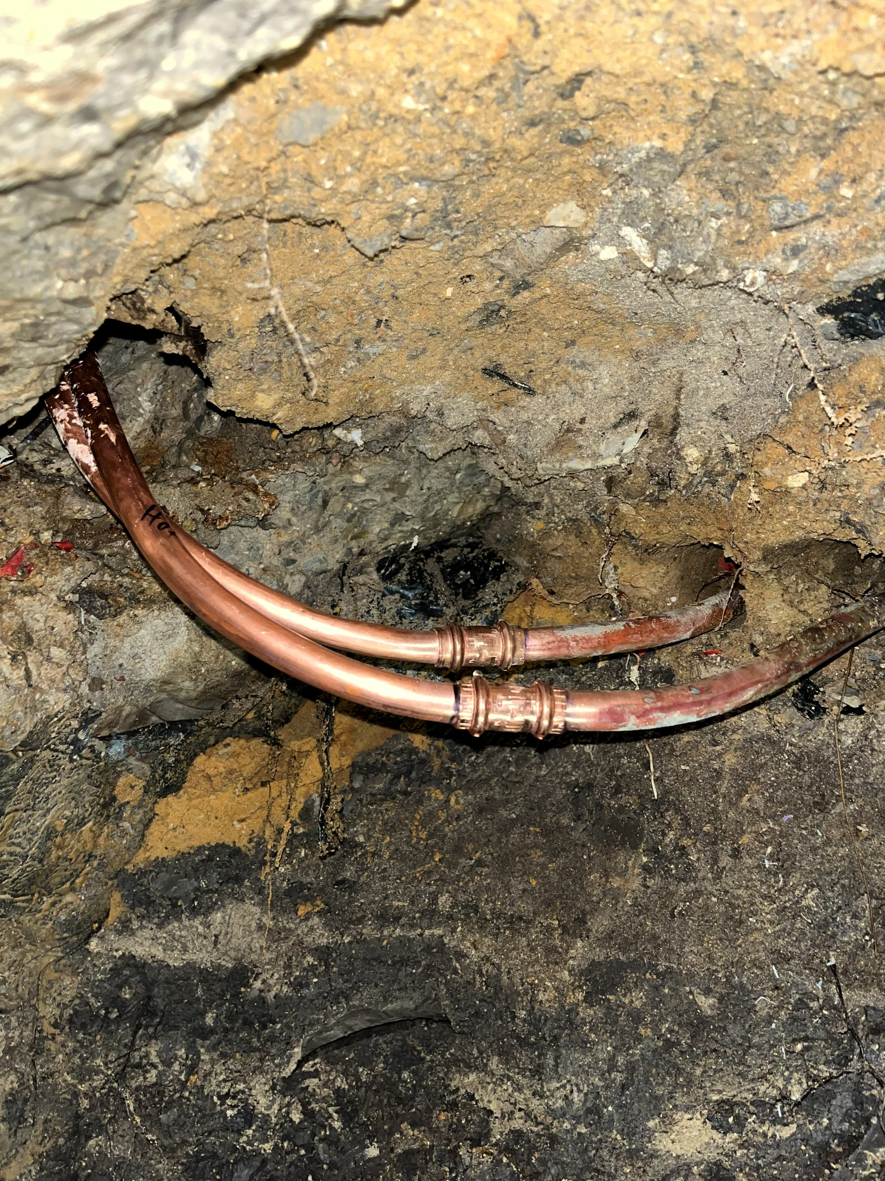 Copper coupling repaired on a line located beneath the slab